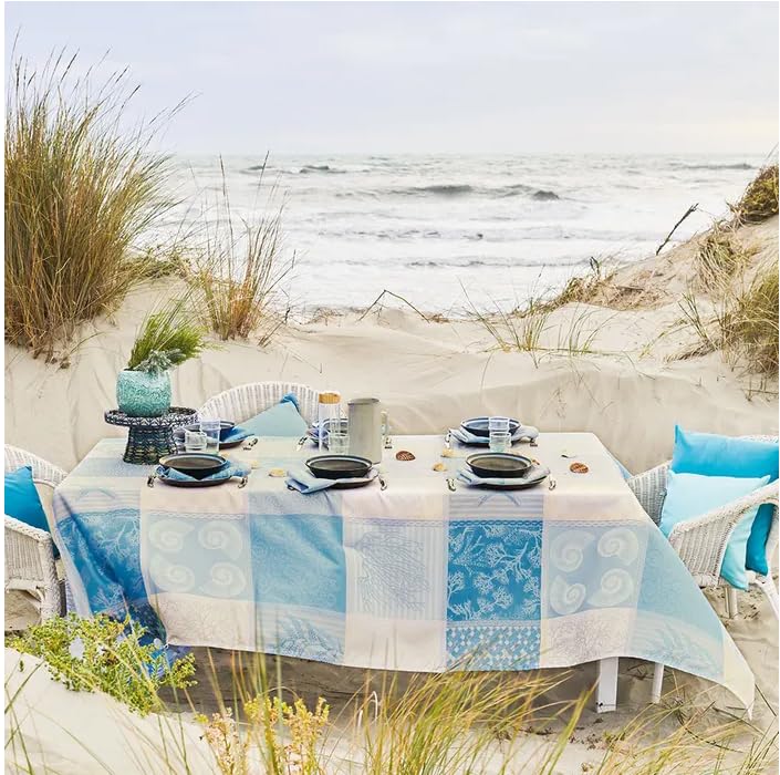 Garnier-Thiébaut Mille Oceans Ecume stain resistant tablecloth blue styled on beach outdoor dining