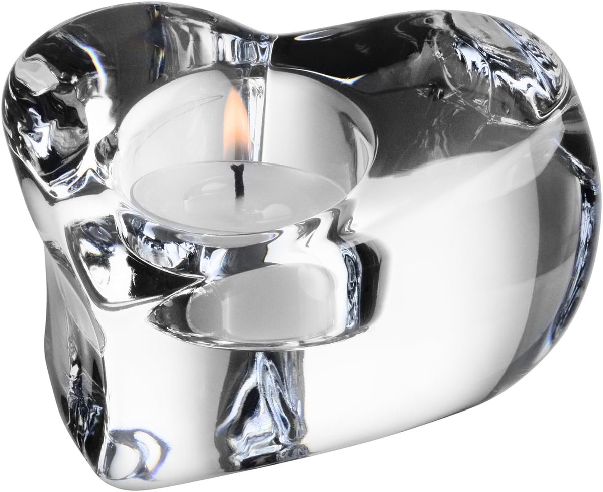 Orrefors Valentino Votive styled with lit candle on table