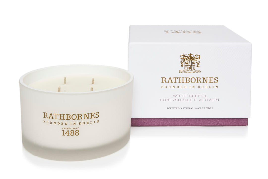 White Pepper Honeysuckle and Vetivert candle in travel and luxury sizes by Rathbornes