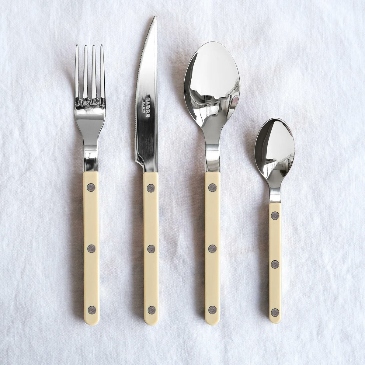 Sabre Paris Bistrot ivory dinner knife, dinner fork and soup spoon
