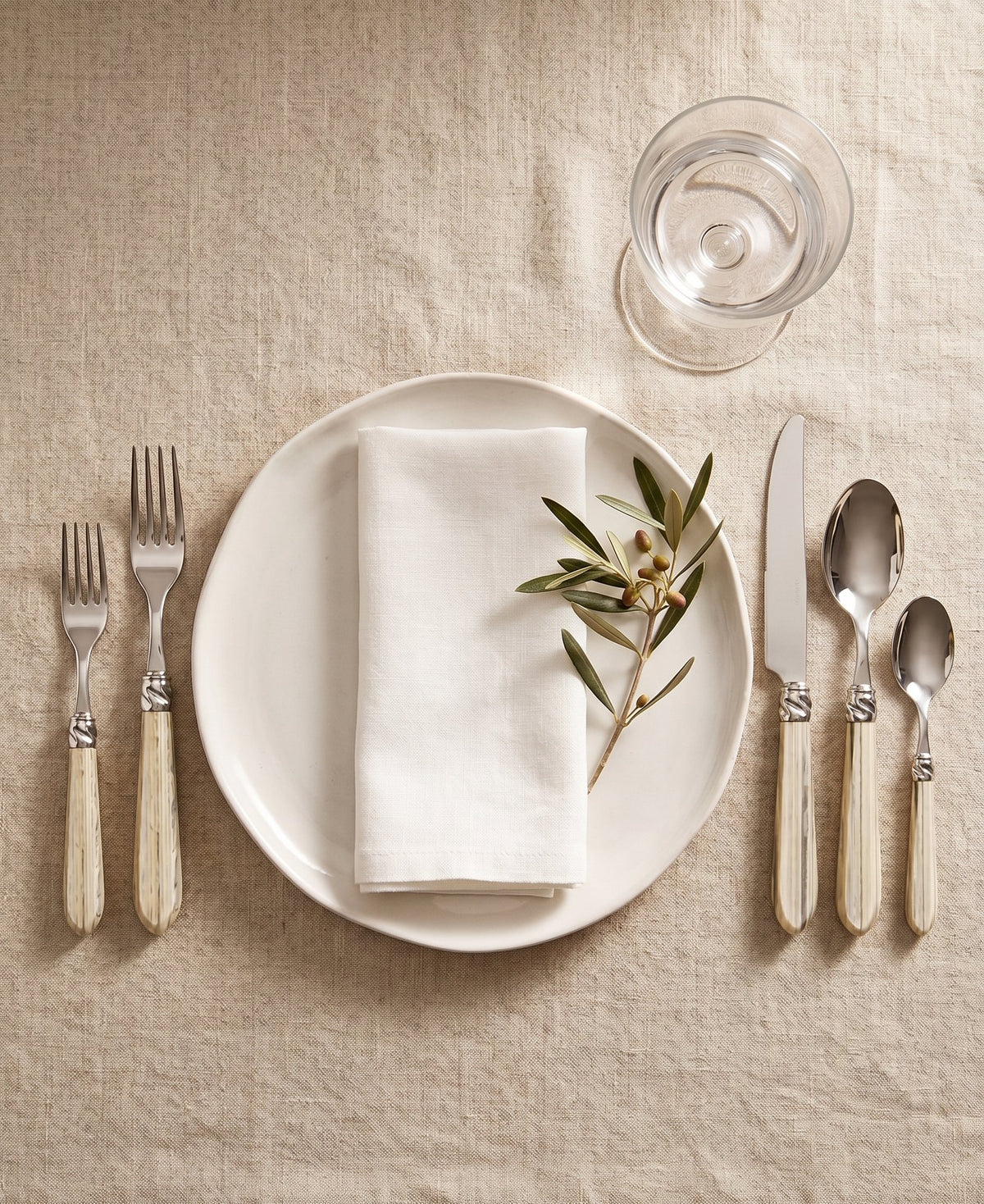 Capdeco Diana Marble Flatware 18/10 Stainless Steel | Cream Marble | 5-Piece Set on table