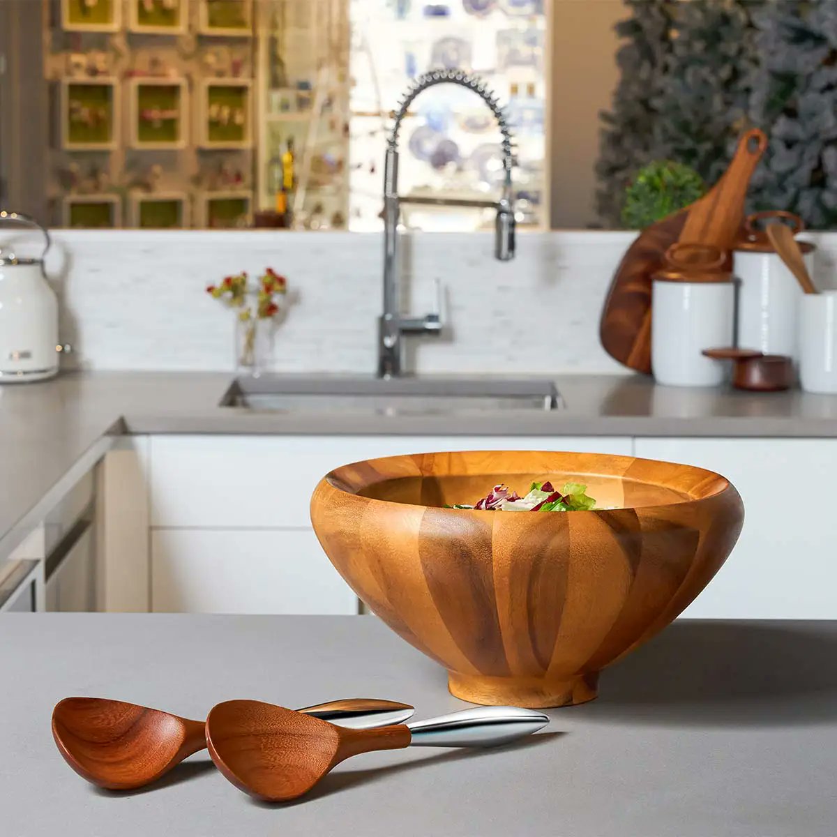 Nambé Yaro Salad Bowl styled with fresh salad on table
