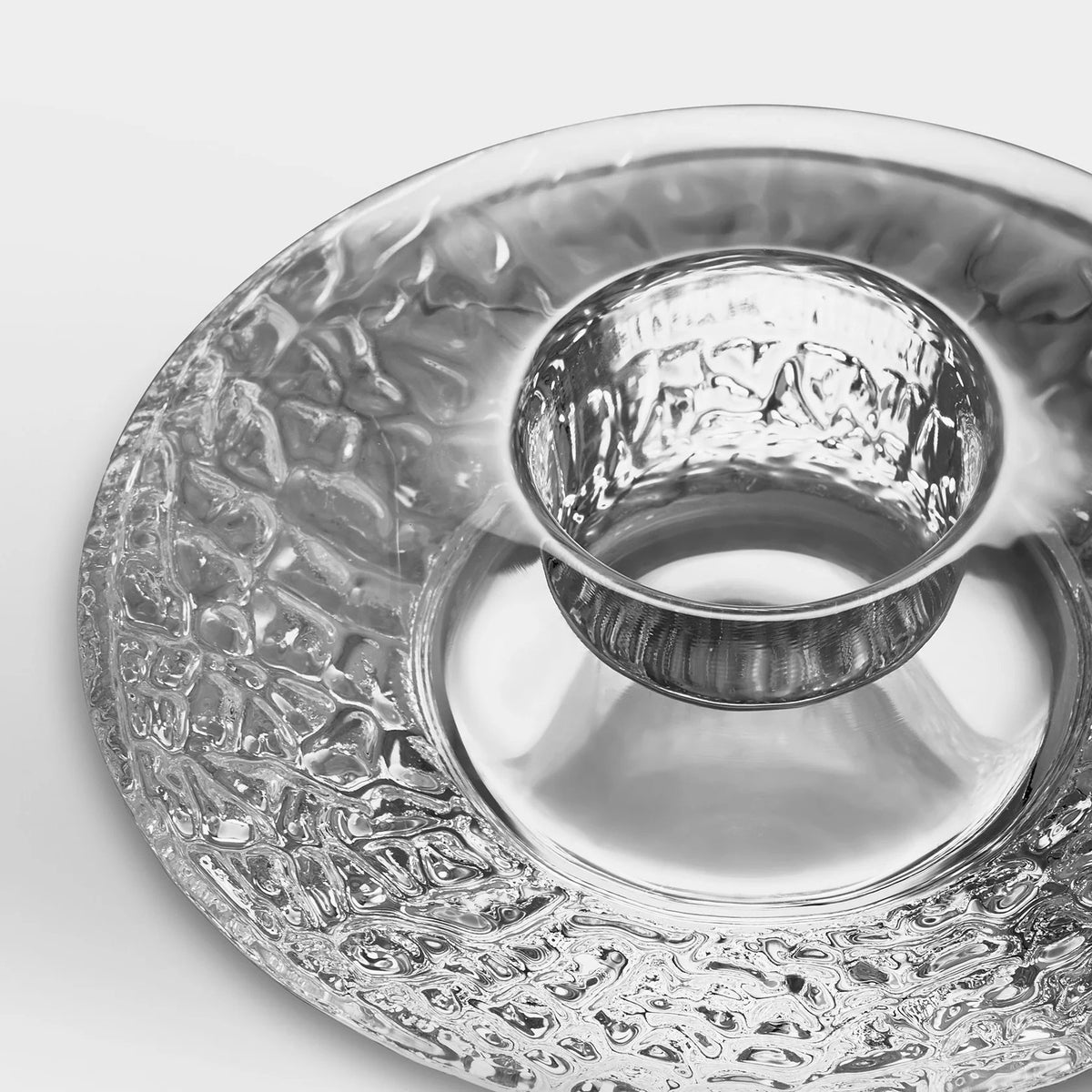 Orrefors Discus Votive close-up showing optical base detail