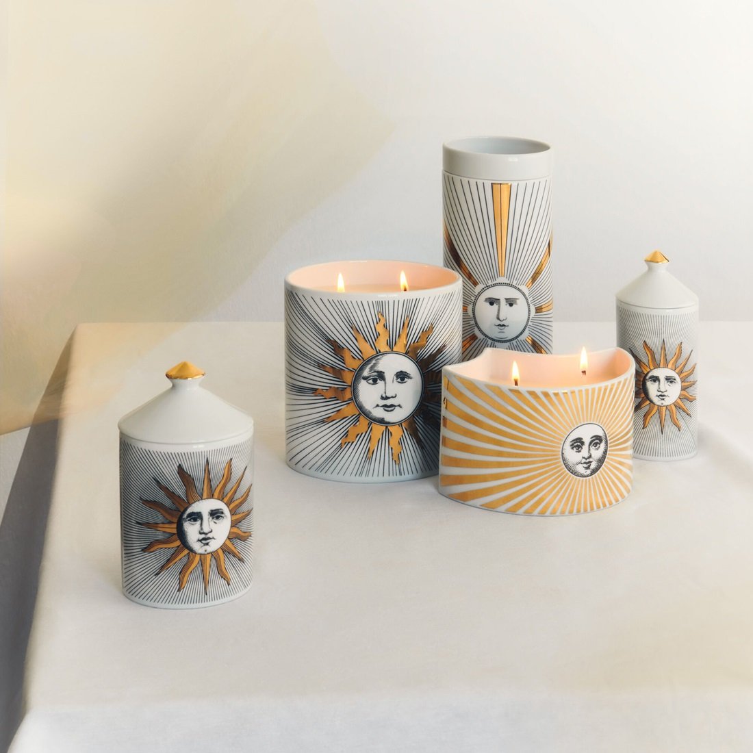 Fornasetti Scented Candle Soli / Sun Decor Aromatic Luxury Candle in a Luxury Vessel Immaginazione Fragrance Woody Noted Small