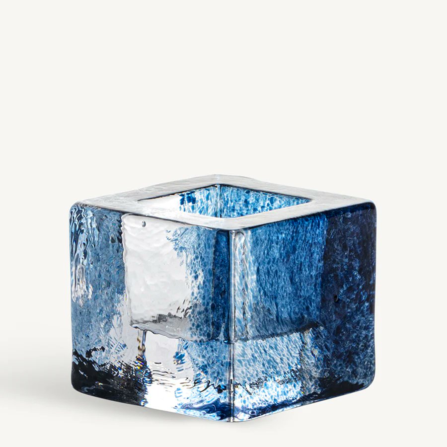 Kosta Boda Brick blue and white square glass votives side by side showing unique color separation pattern