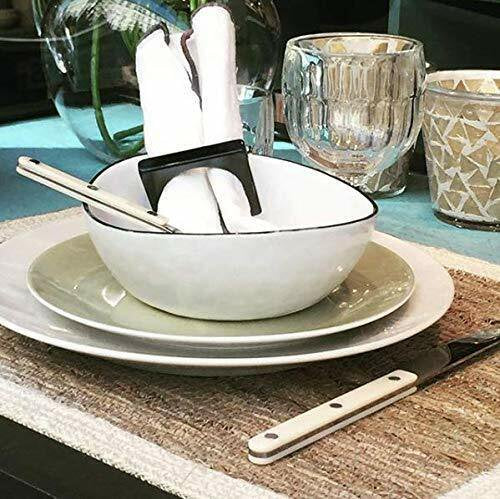 Sabre Paris Bistrot ivory flatware set on a dinner table