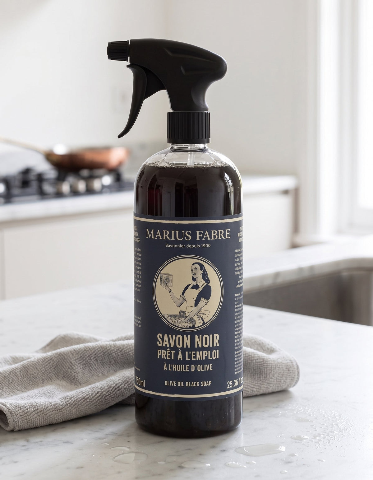 Marius Fabre Black Soap being used on kitchen surface