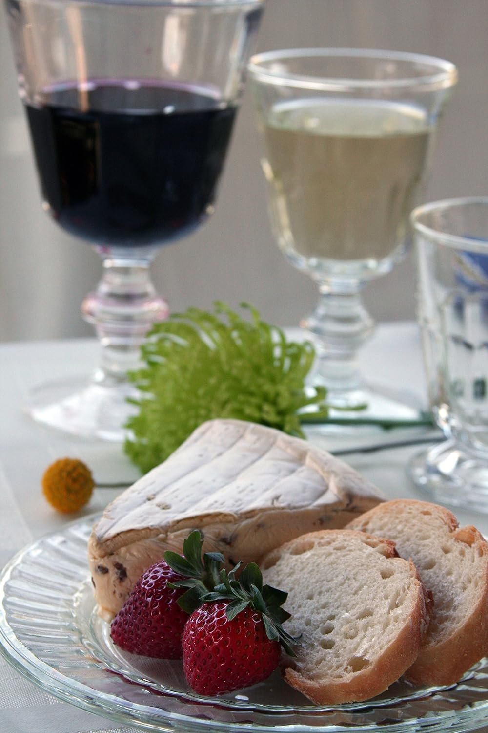 Set of six La Rochère Périgord wine glasses styled with wine