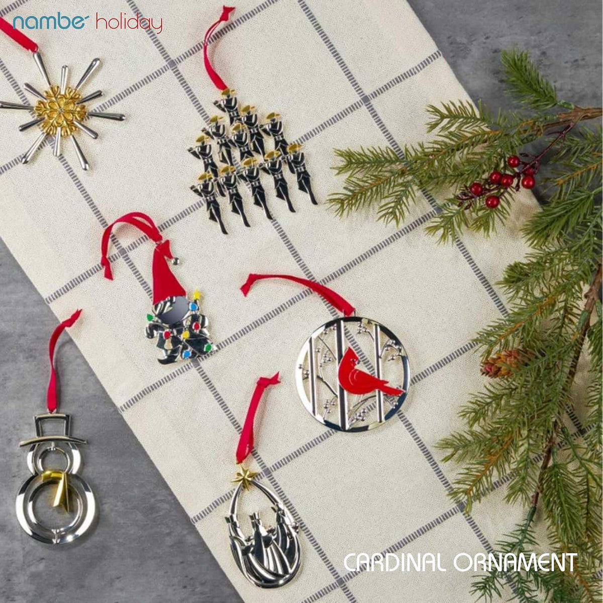 Nambé Cardinal Ornament styled hanging on Christmas tree