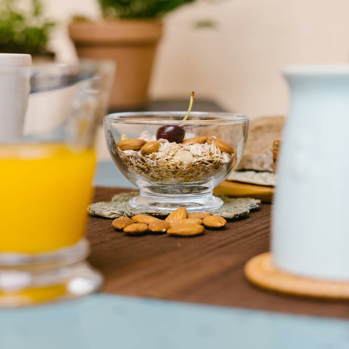 Set of six La Rochère Bee mini bowls styled with snacks