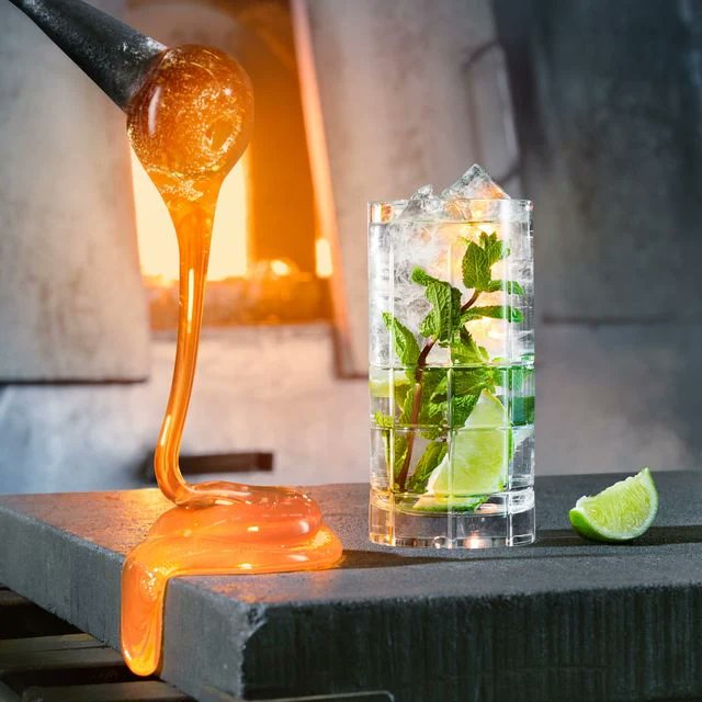 Orrefors Street Highball styled with cocktail being poured
