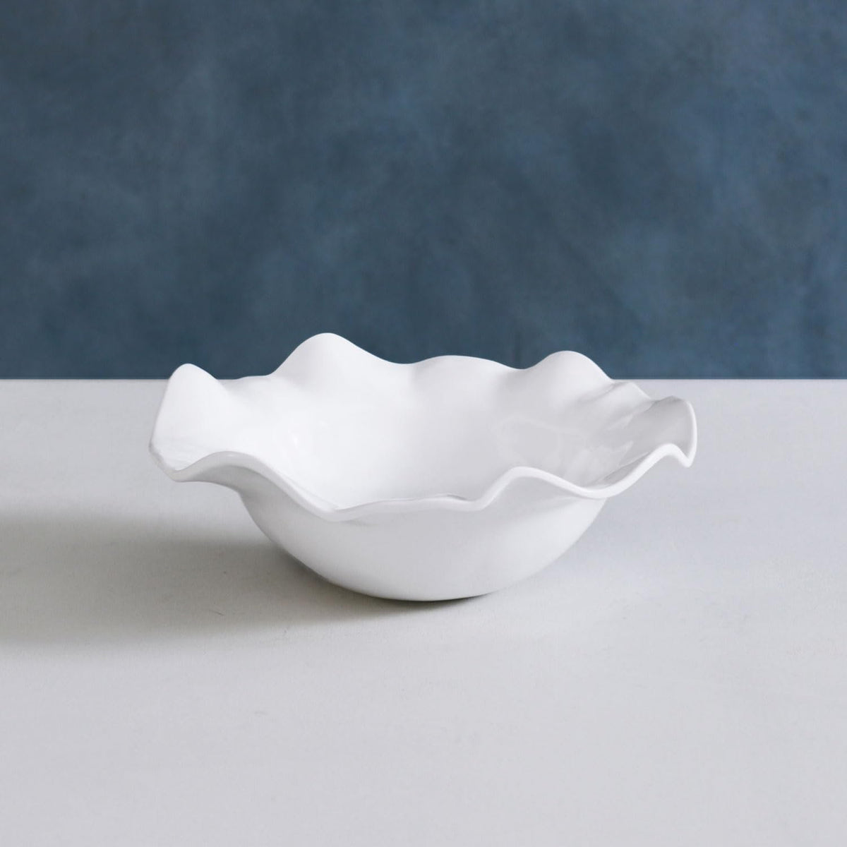 Beatriz Ball VIDA Havana medium bowl white styled on dining table with fruit salad entertaining