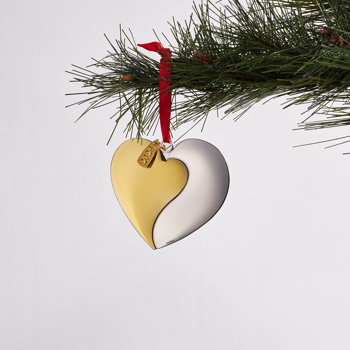 Nambé Our First Christmas Together Ornament styled hanging on tree