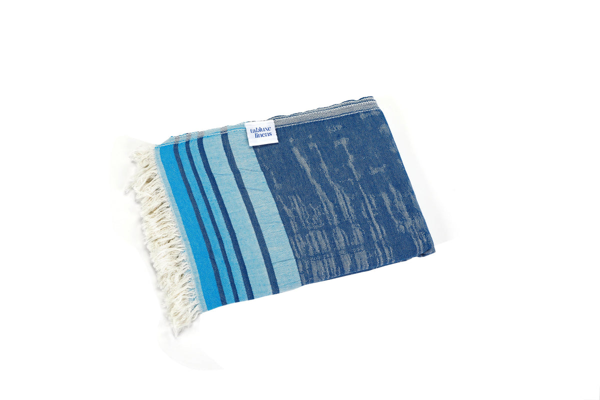 High-quality Turkish towel made from 100% cotton — lightweight, soft, and sand-free for everyday use.