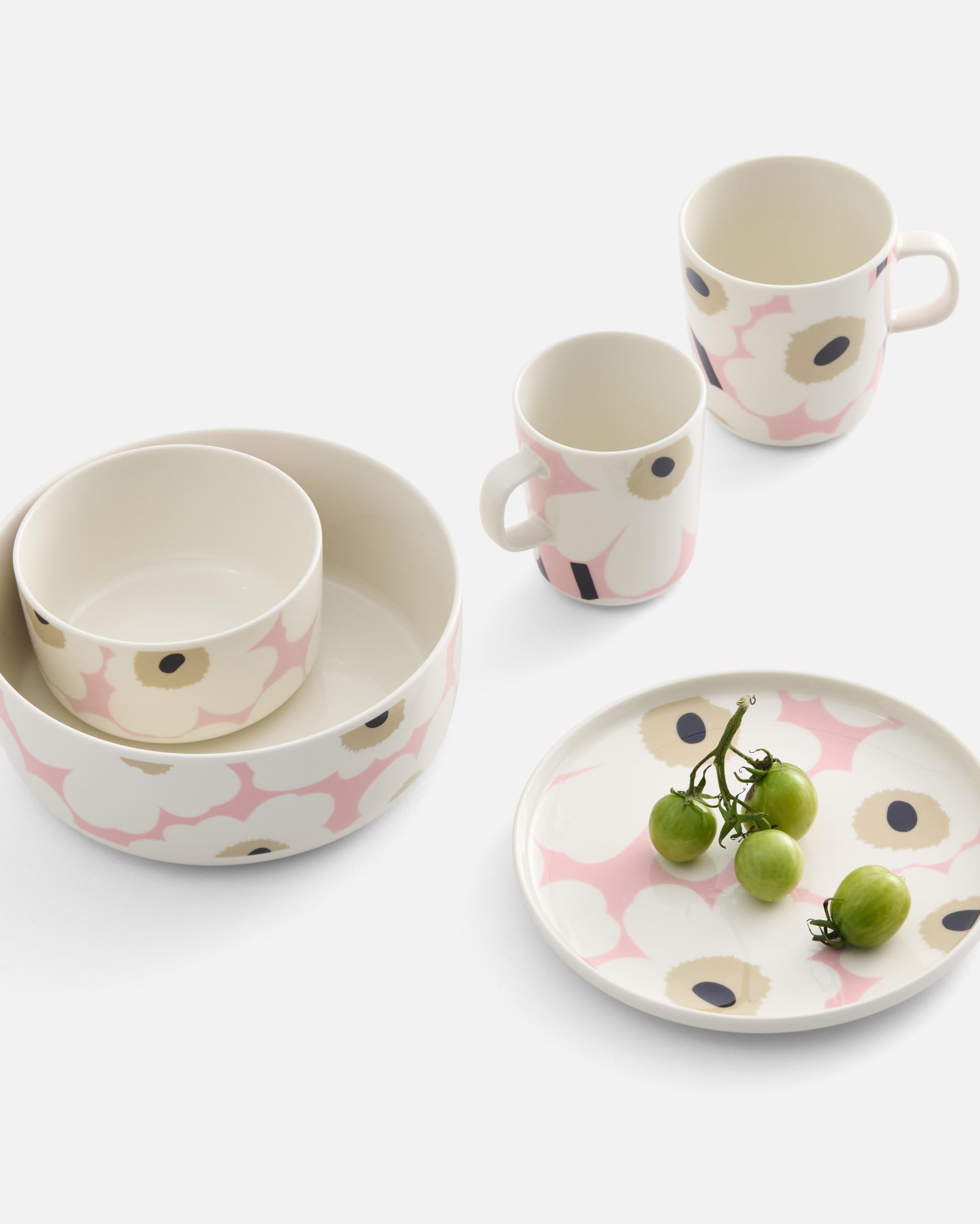 Marimekko Oiva mug with floral Unikko pattern in muted pink tones