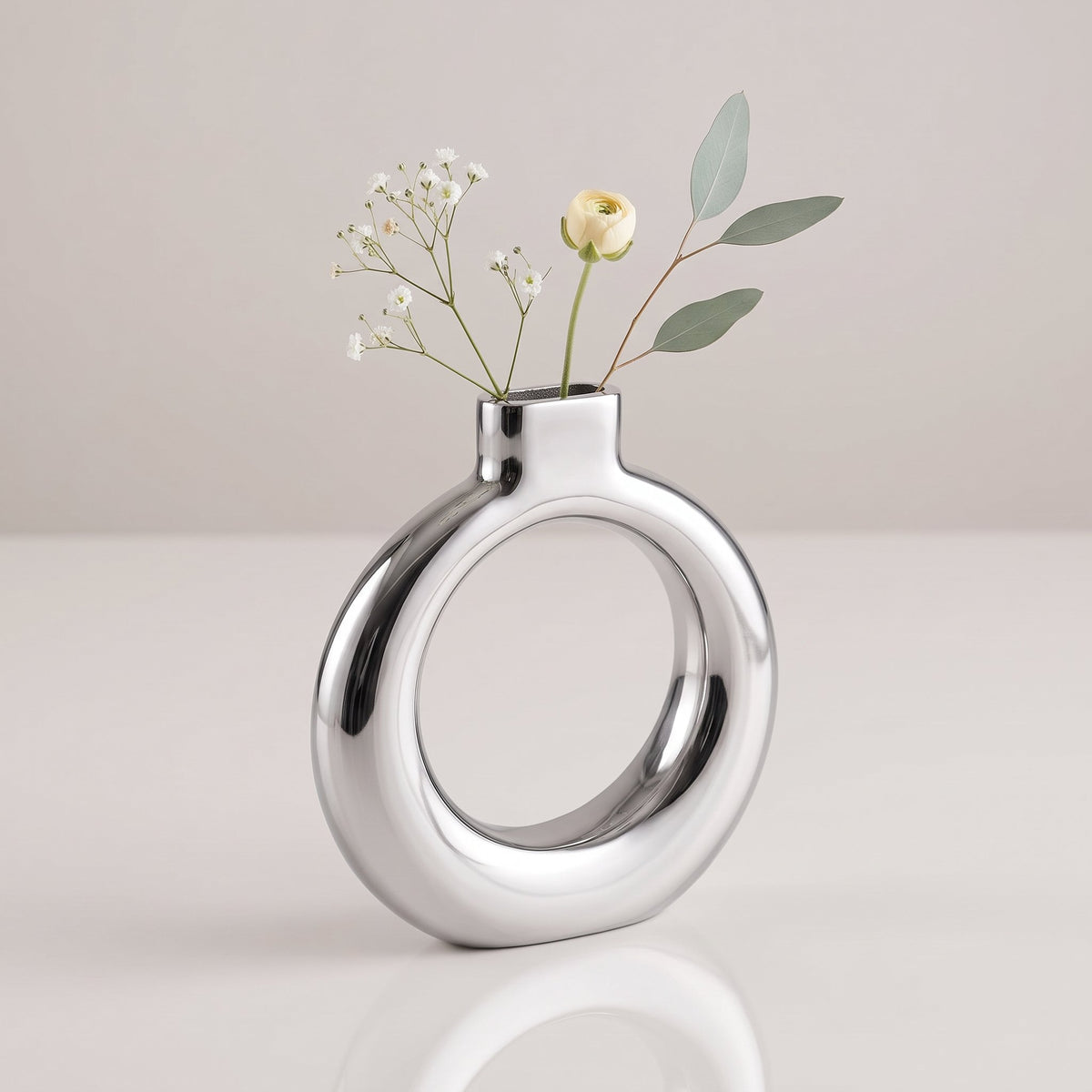 Nambé Solarium Full Moon Vase styled with fresh floral arrangement
