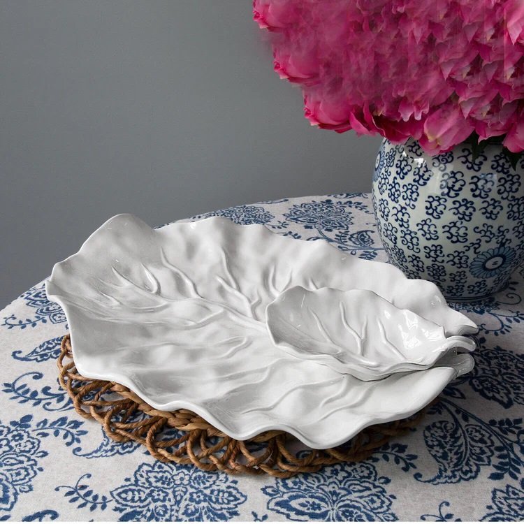 Beatriz Ball VIDA Lettuce Leaf chip dip white styled on entertaining table with vegetables dips