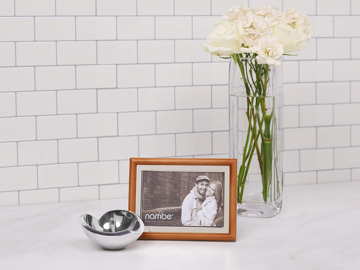 Nambé Hayden Picture Frame styled on mantel with framed photo