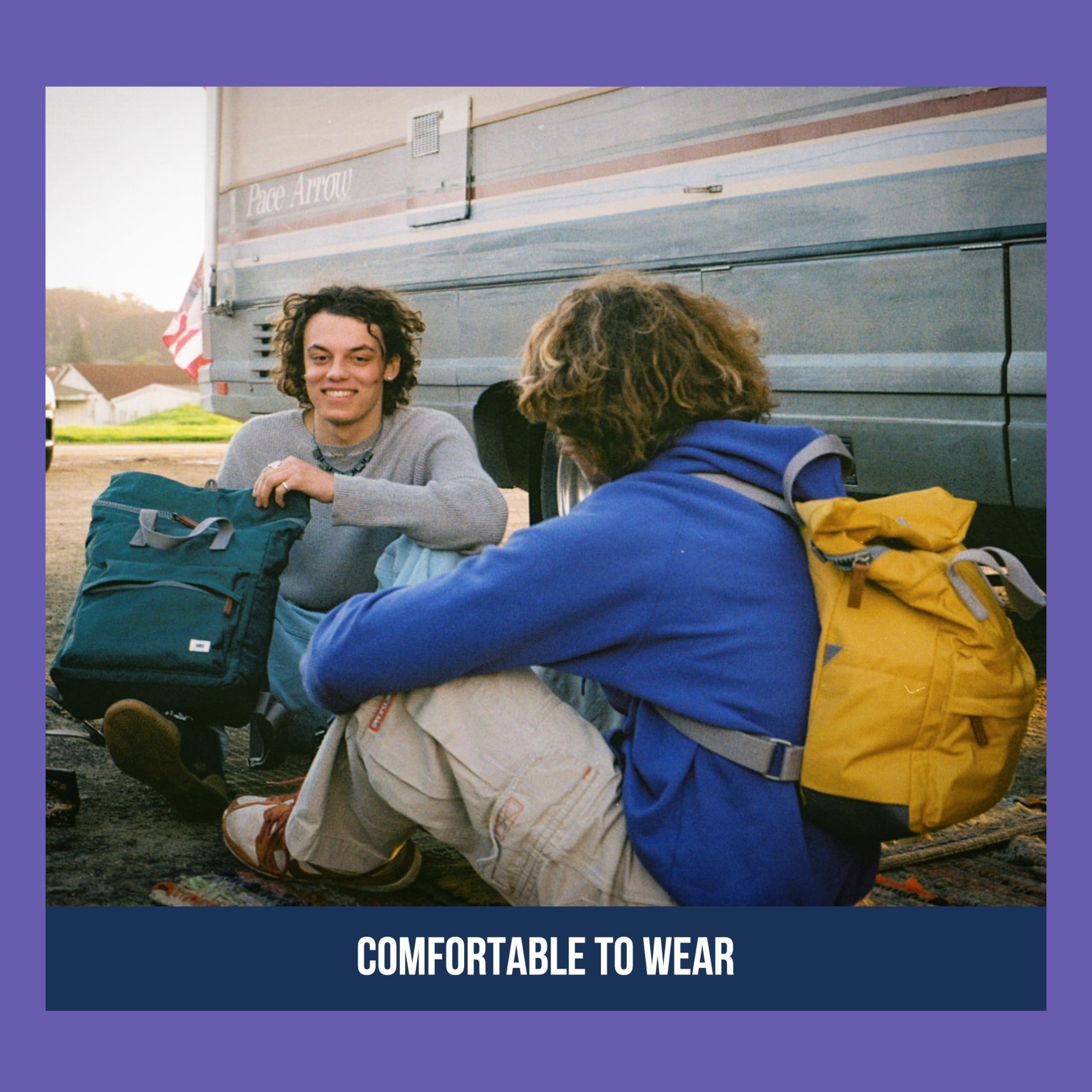 Close-up of chunky zipper and triple-coated canvas base on burnt blue Canfield bag