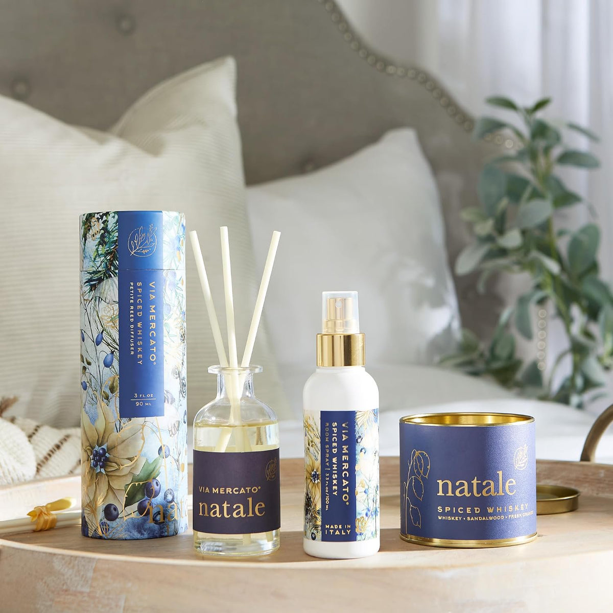Via Mercato Natale Spiced Whiskey home fragrance set styled on shelf holiday seasonal decor