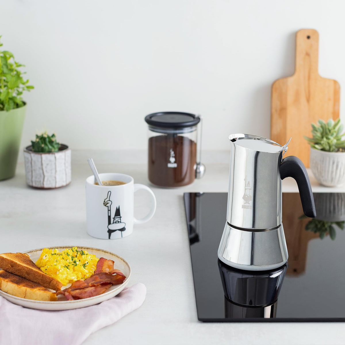 Close-up of Bialetti Venus Induction showing stainless steel finish patented safety valve and elegant design