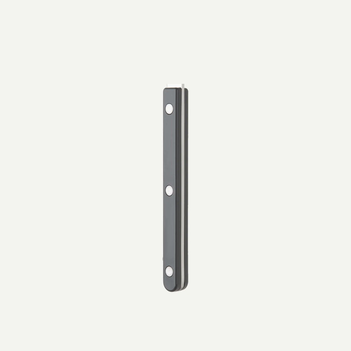 Close-up of riveted dark grey handle on Sabre Paris Bistrot flatware