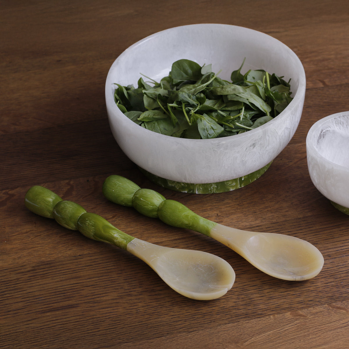 Beatriz Ball RESIN Rio 11" white green bowl with contrasting base close-up swirl pattern