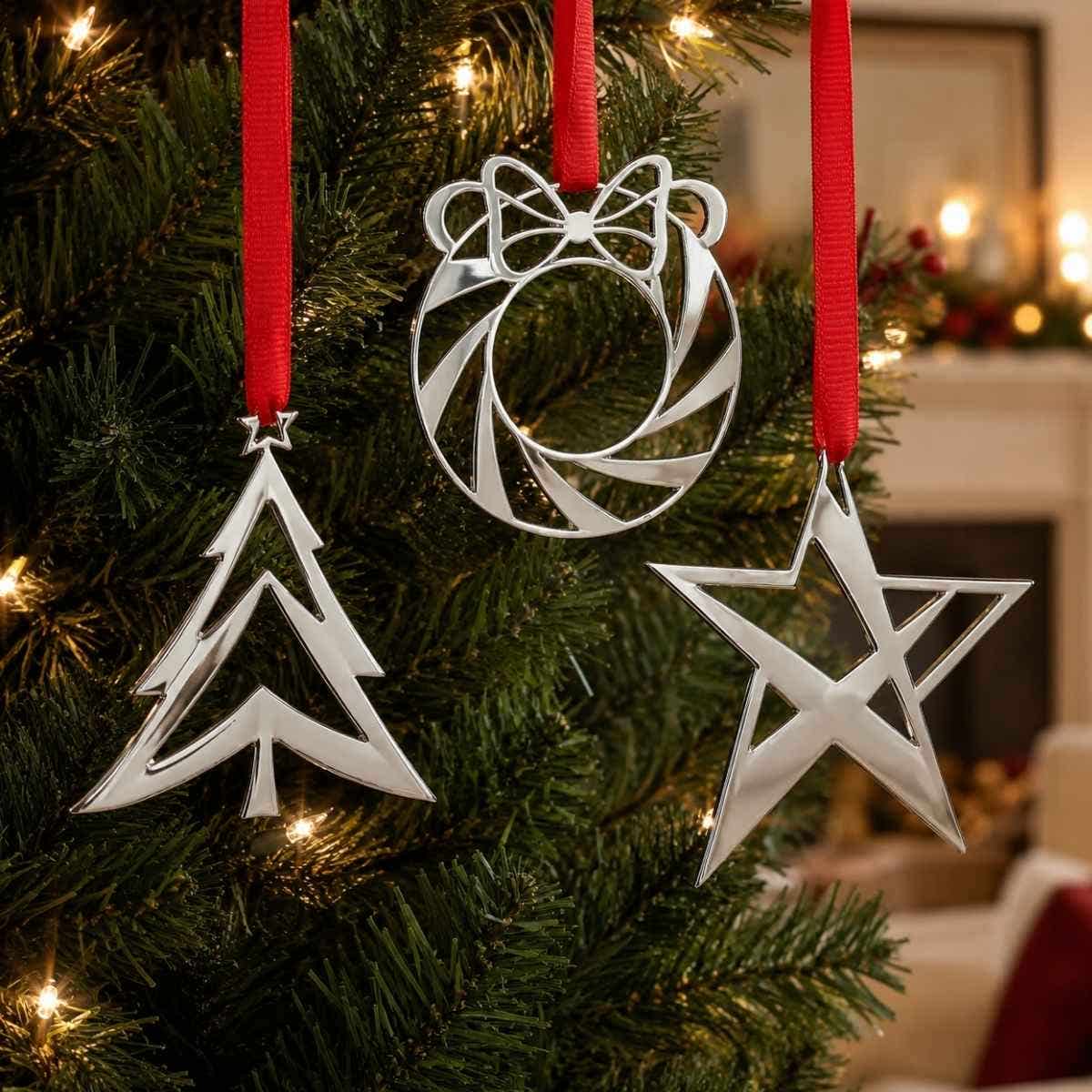 Nambé Mini Ornaments styled on Christmas tree branch
