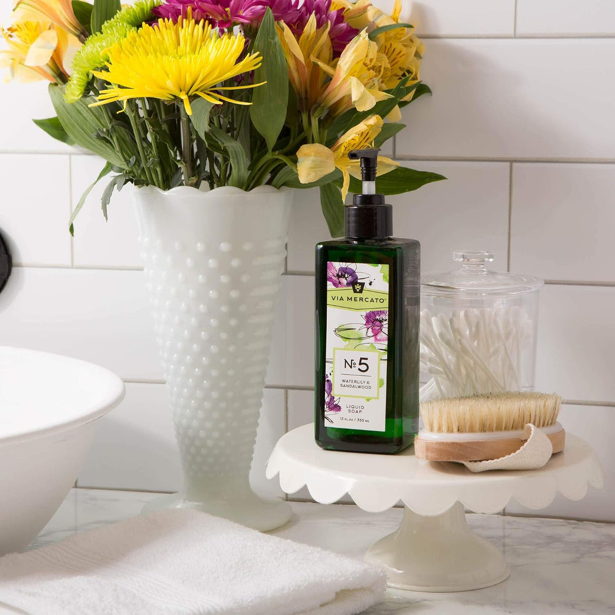 Via Mercato No.5 waterlily sandalwood liquid hand soap 12oz styled on bathroom sink countertop