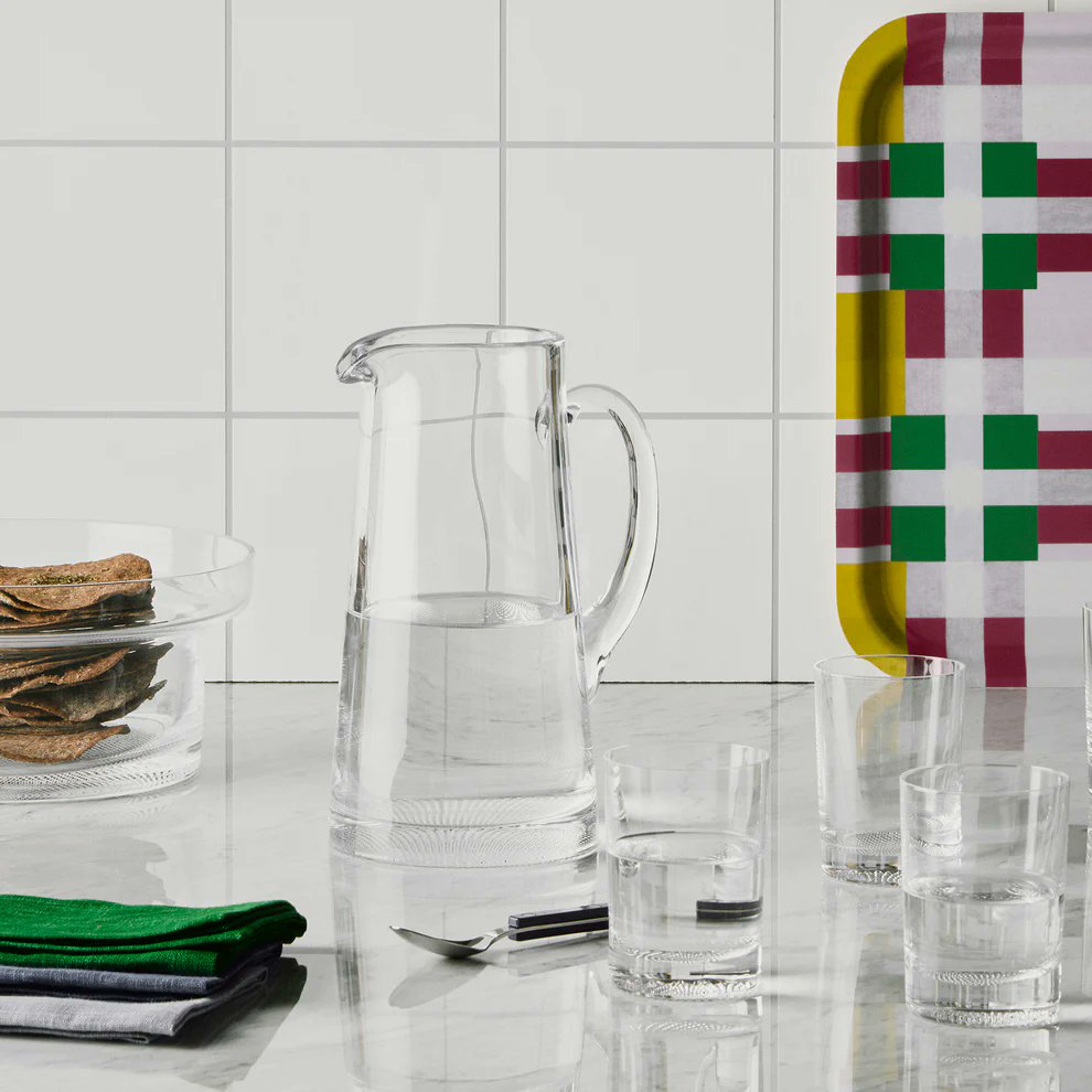 Kosta Boda Limelight clear crystal pitcher styled on entertaining table – Swedish handmade glass by Göran Wärff
