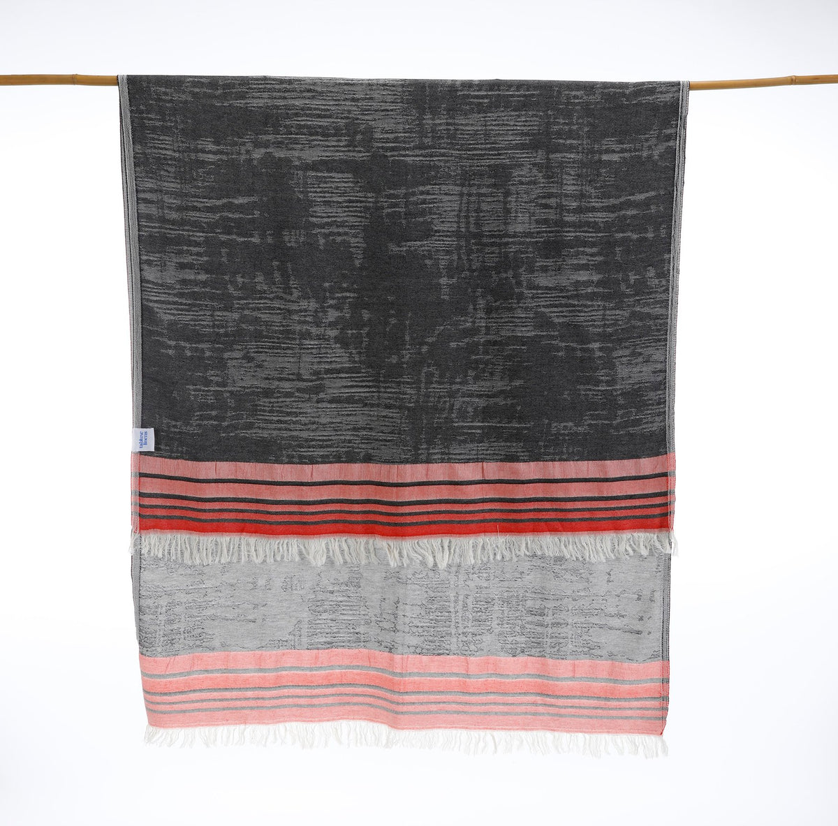 Versatile Turkish towel that doubles as a beach wrap, scarf, or travel essential — stylish and functional