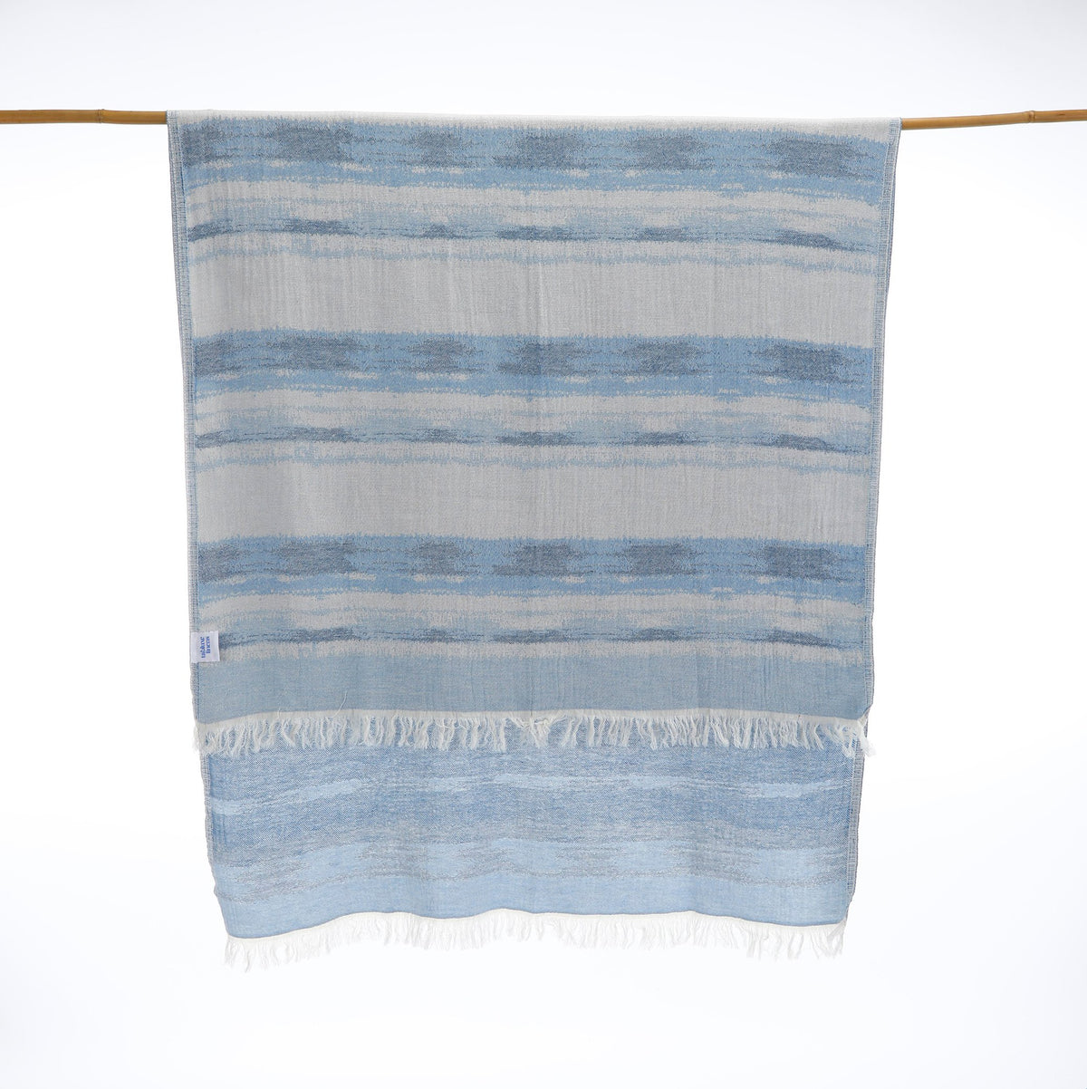 High-quality Turkish towel made from 100% cotton — lightweight, soft, and sand-free for everyday use