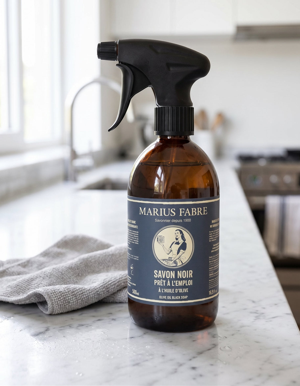 Marius Fabre Black Soap being used on kitchen surface