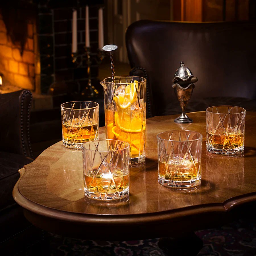 Orrefors City DOF Glasses styled with whiskey on bar cart