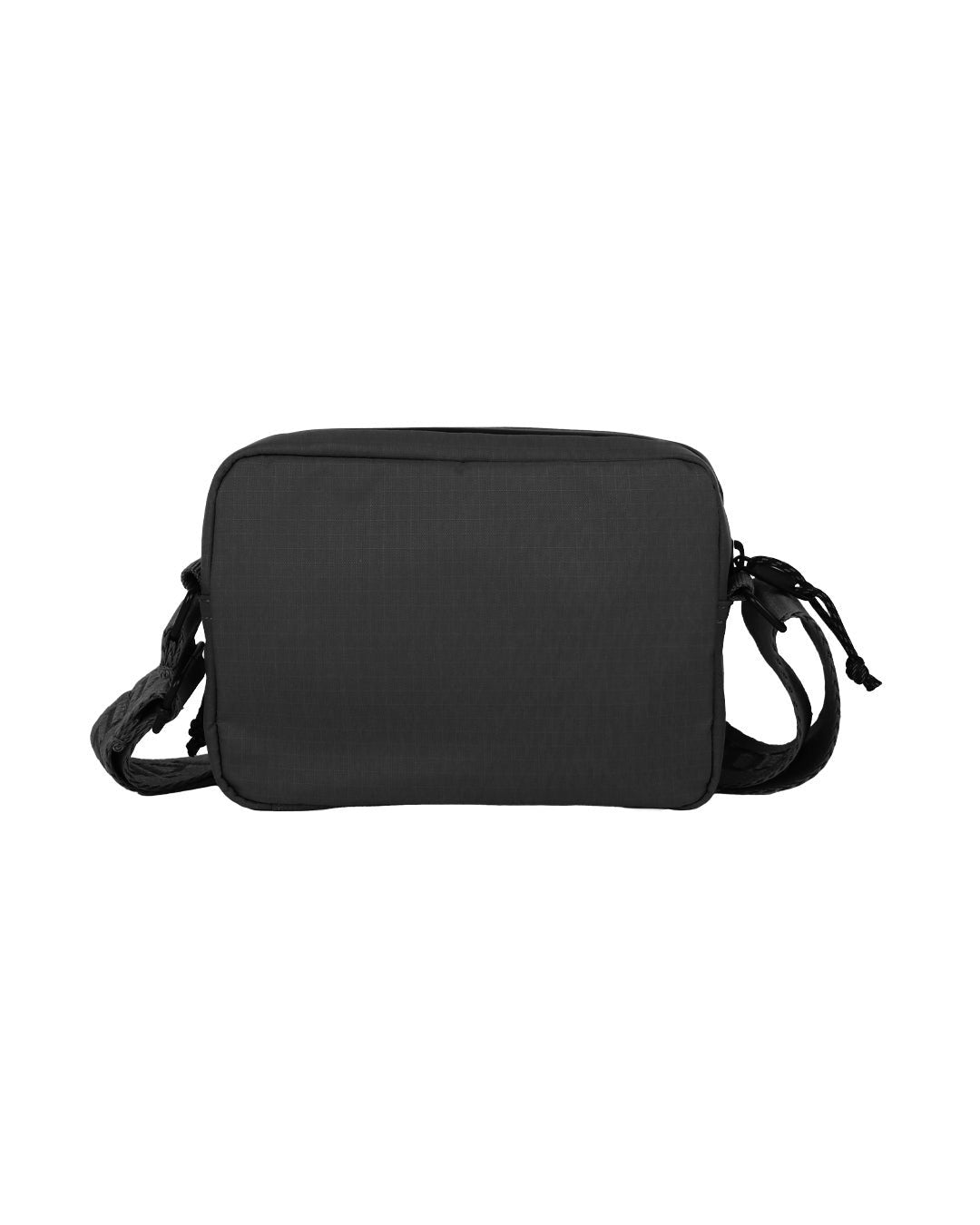 Kintobe Mini Miles black crossbody bag styled as travel and daily carry – sustainable recycled nylon bag
