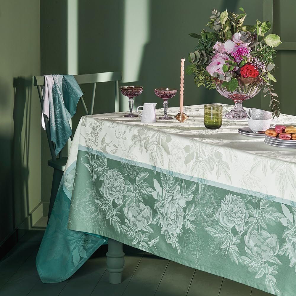 Garnier-Thiébaut Jardin de Pivoines Vert jacquard tablecloth green three sizes on dining table