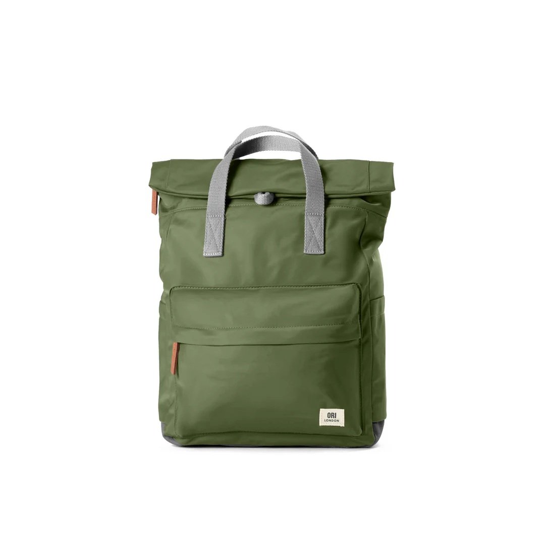 ORI London Canfield B backpack in avocado green with roll-top and chunky zipper