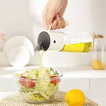 Cuisipro Oil & Vinegar No-Drip Dispenser ivory on salad