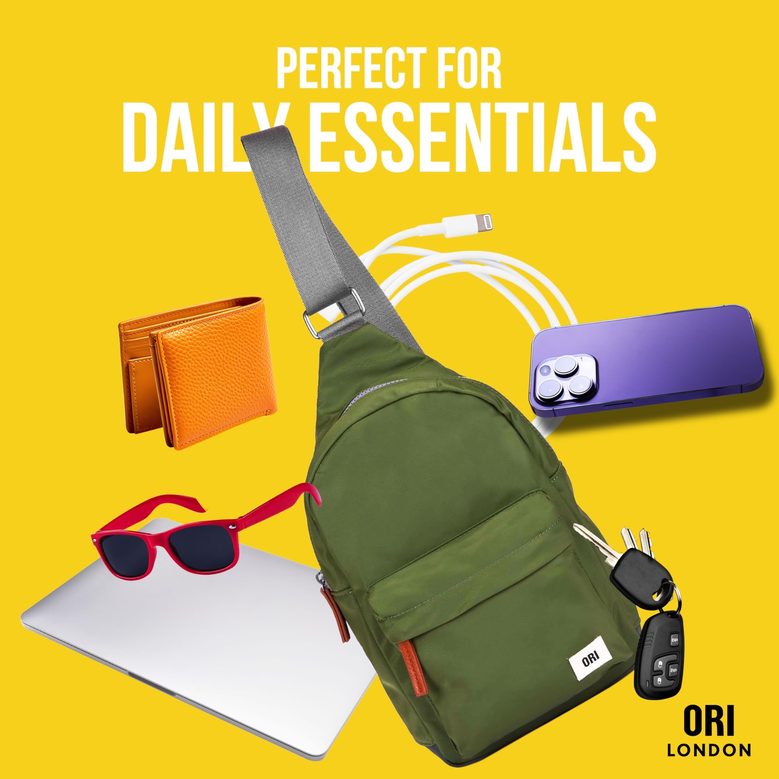 Unisex black travel sling bag from ORI London with functional compartments and sleek design