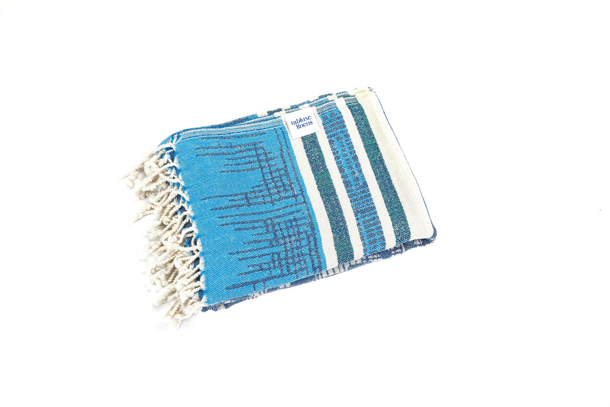 Luxury Turkish cotton towel in blue arrow design, lightweight and absorbent for beach, poolside, and everyday use