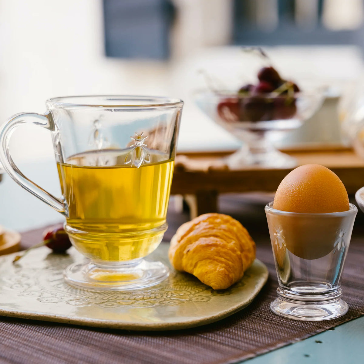 Set of six La Rochère Bee coffee mugs styled on table
