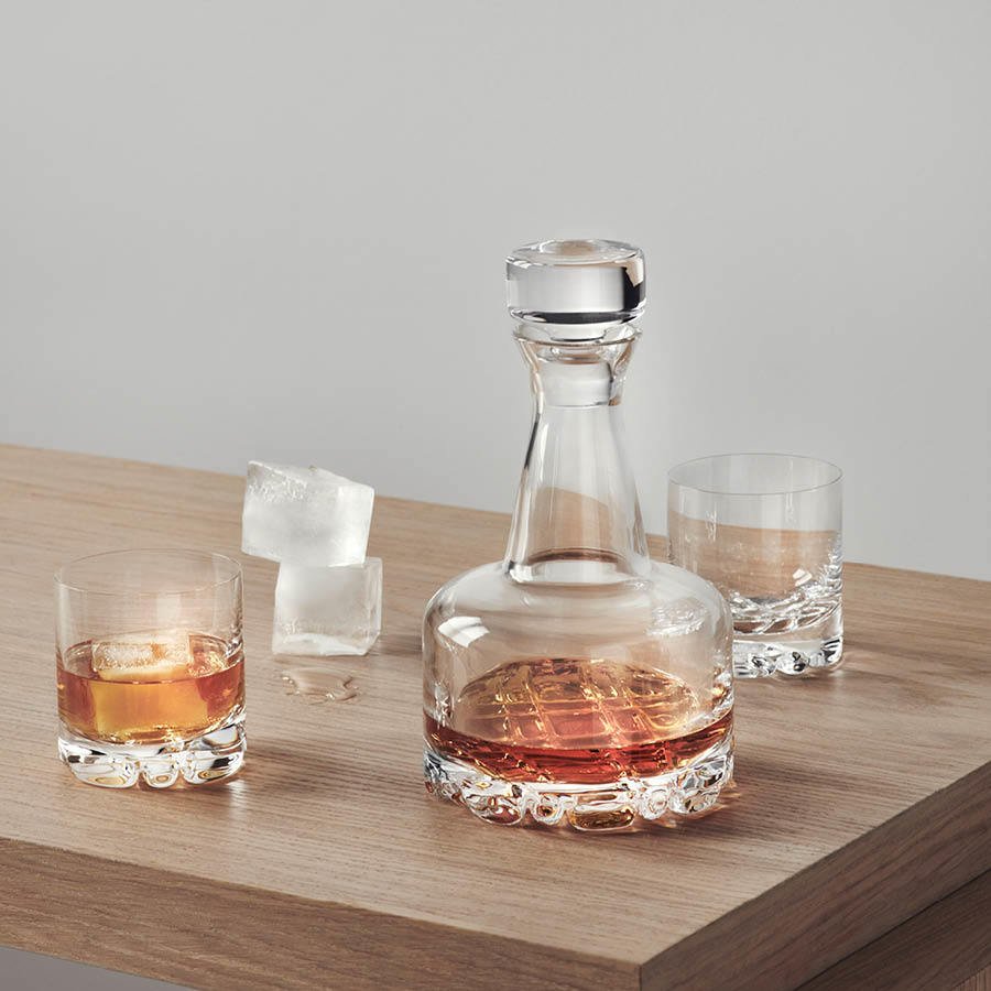 Orrefors Erik 3-Piece Set styled with whiskey on bar cart