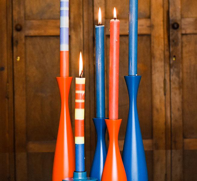 British Colour Standard orange and blue striped dinner candles styled on table – Fair Trade hand-poured non-drip