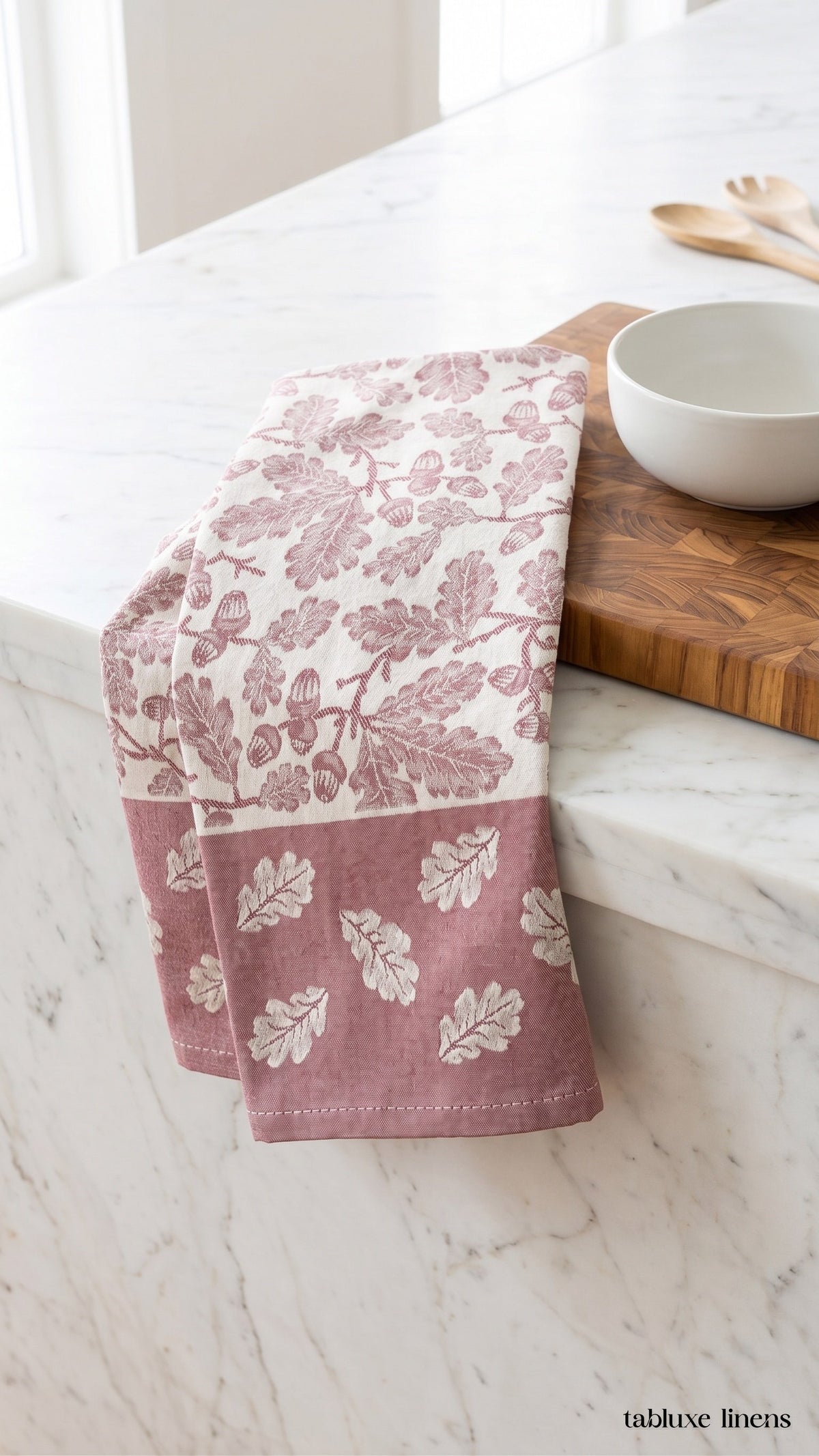Busatti Rovere Burgundy dish towel draped on marble kitchen counter