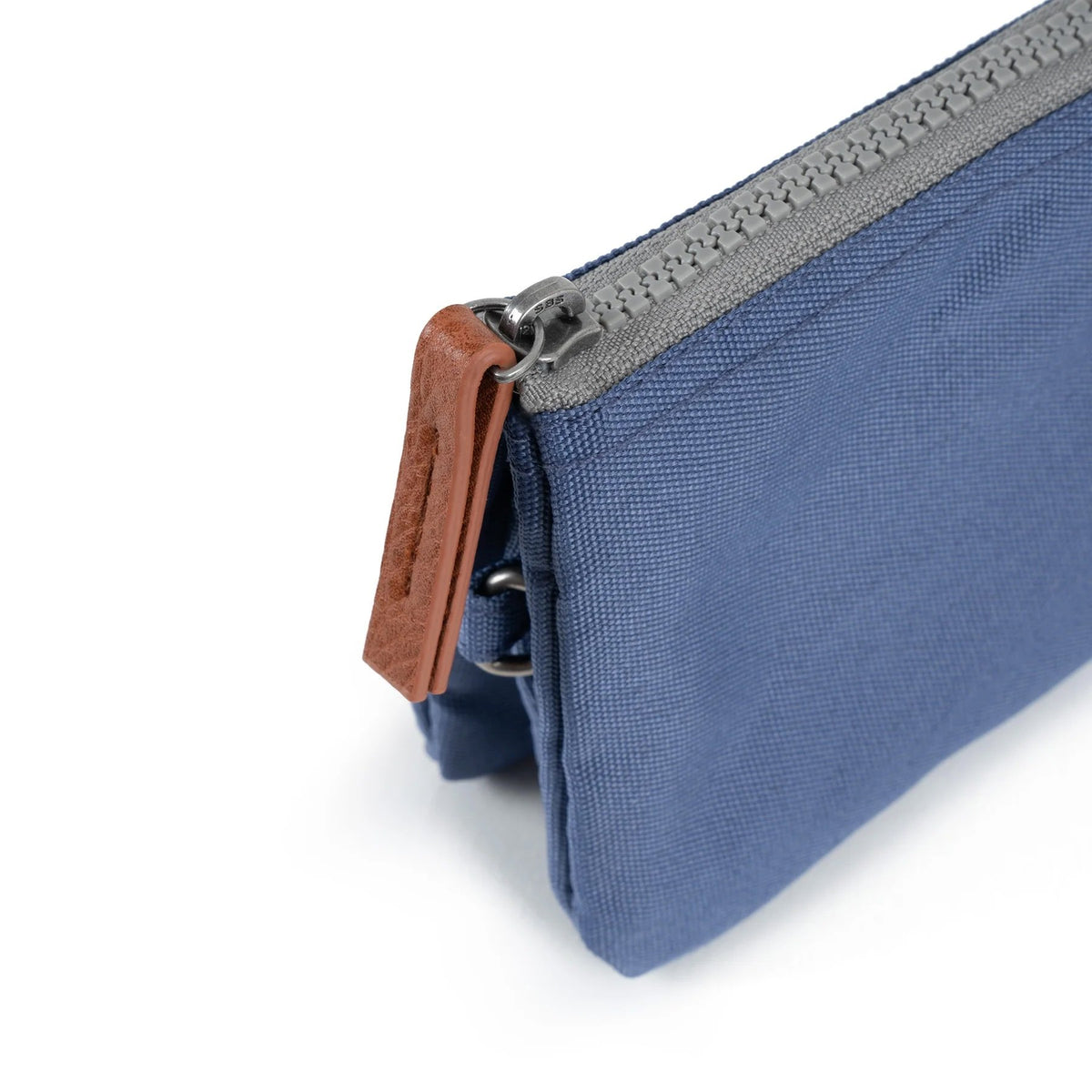 Carnaby recycled canvas wallet in hand for size reference