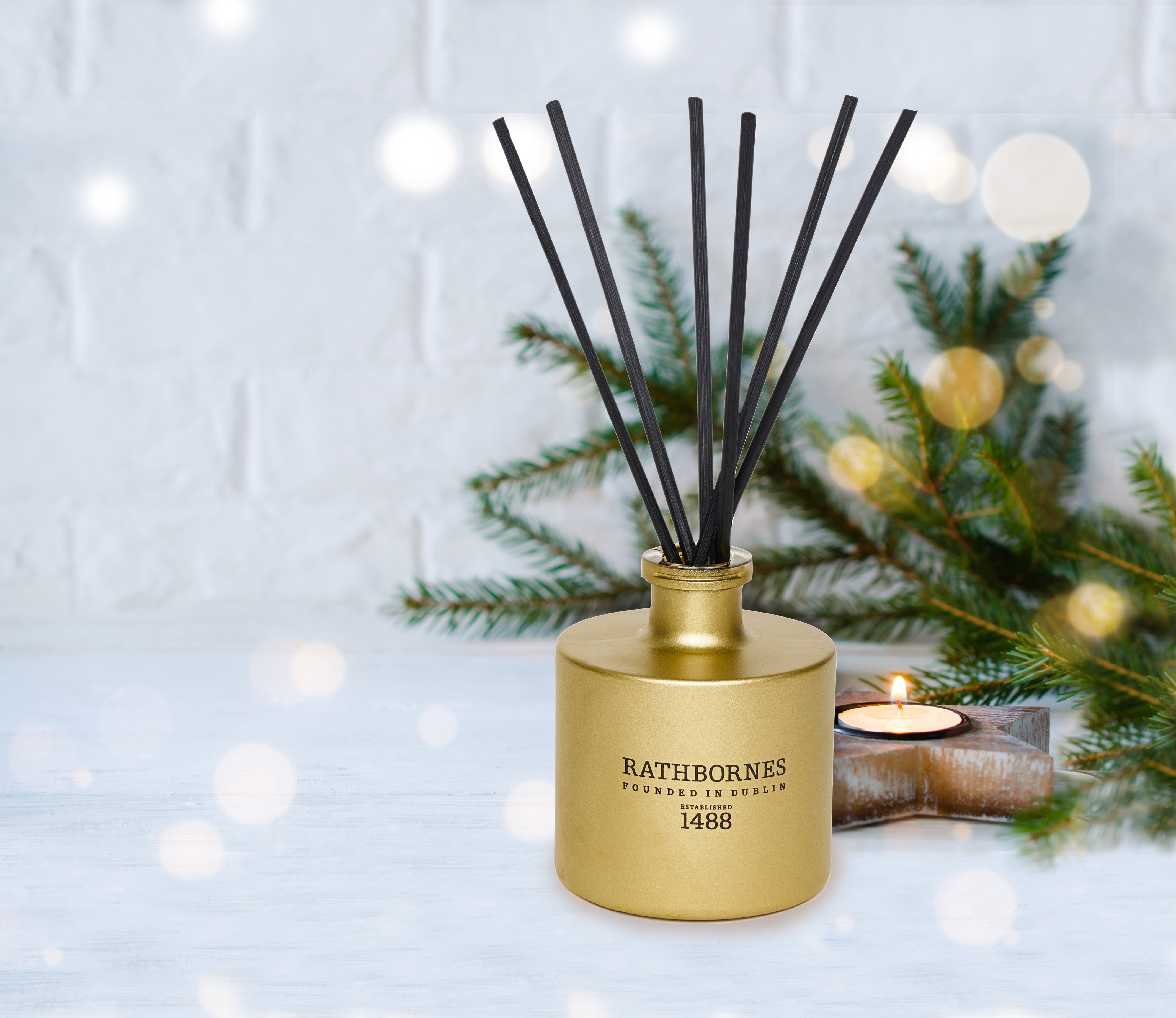 Luxury Christmas reed diffuser with pine and warm spice notes